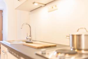 A kitchen or kitchenette at Lettnerhof Bnb Wohnung 3