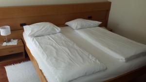 Postel nebo postele na pokoji v ubytování Hotel Mare & Monti