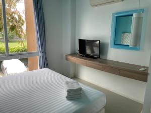 TV a/nebo společenská místnost v ubytování Atlantis Condo Resort jomtien