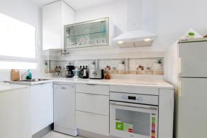 Kuchyň nebo kuchyňský kout v ubytování Tanit Apartment@Ducado