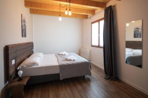 Agriturismo ai Due Leoni客房内的一张或多张床位