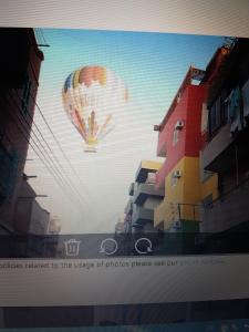 a billboard with a picture of a hot air balloon at Bob Marley Hotel Luxor in Luxor