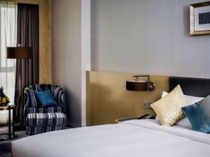 Postel nebo postele na pokoji v ubytování Pullman Changshu Leeman
