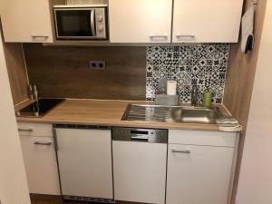 Kuchyň nebo kuchyňský kout v ubytování Apartment Goisernperle