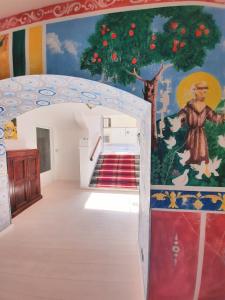A bed or beds in a room at Hotel San Francesco e il lupo