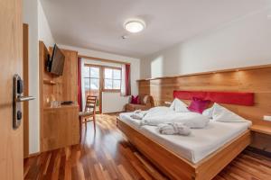 Posteľ alebo postele v izbe v ubytovaní Felsners Hotel & Restaurant