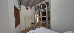 Postel nebo postele na pokoji v ubytování LA CASITA