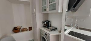 Kuchyň nebo kuchyňský kout v ubytování LA CASITA