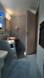 A television and/or entertainment centre at Villa Christa