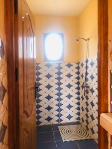 Ванная комната в Riad Hotel Les Flamants