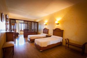 Ένα ή περισσότερα κρεβάτια σε δωμάτιο στο Balneario San Nicolas