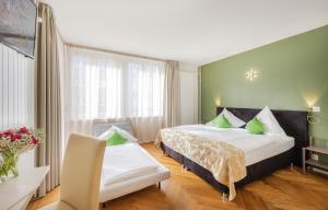 Ένα ή περισσότερα κρεβάτια σε δωμάτιο στο Hotel Oltnerhof - Self Check in