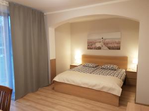 Postel nebo postele na pokoji v ubytování Raganas Ķēķis Hotel + 30 fotografií