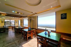 Area soggiorno di JK Hotel Dharamshala