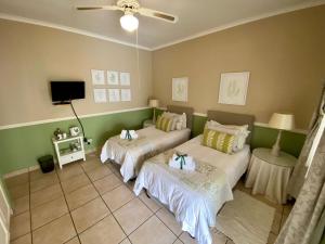 Katil atau katil-katil dalam bilik di Shandon Lodge Guest House & Spa