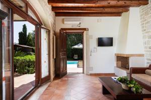 A television and/or entertainment centre at Kalimera villas