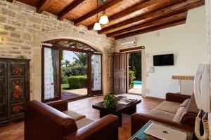 A television and/or entertainment centre at Kalimera villas
