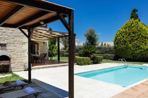The swimming pool at or close to Kalimera villas