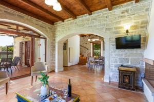 A television and/or entertainment centre at Kalimera villas