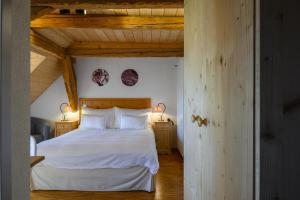 Postel nebo postele na pokoji v ubytování Les Montagnards