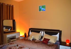 Postel nebo postele na pokoji v ubytování Niv Villa