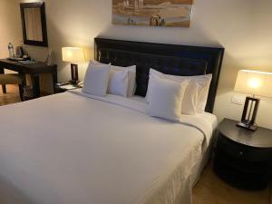 Barceló Cairo Pyramids 객실 침대