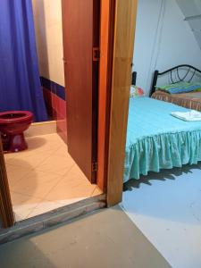 Ένα ή περισσότερα κρεβάτια σε δωμάτιο στο Casa de Campo La Prosperidad