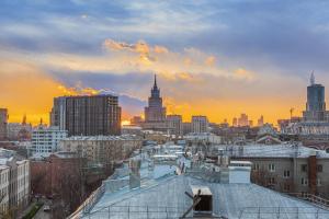a view of a city skyline at sunset at Hotel Mandarin in Moscow