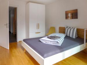 Postel nebo postele na pokoji v ubytování Apartment Momento by Interhome