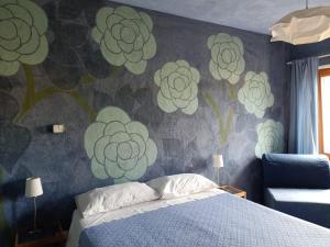 Postel nebo postele na pokoji v ubytování I Conti della Serva