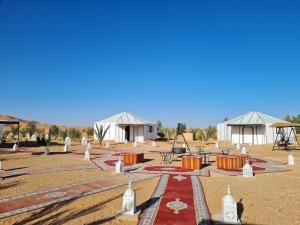 Gallery image of Desert camp camel & sandboarding in Merzouga