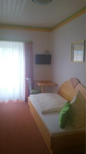 Postel nebo postele na pokoji v ubytování Pension Siegelbrunn B&B