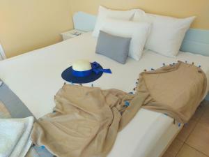 A bed or beds in a room at Celeste Golden Beach