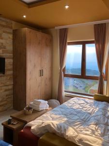 Ein Bett oder Betten in einem Zimmer der Unterkunft MinaSweetLook