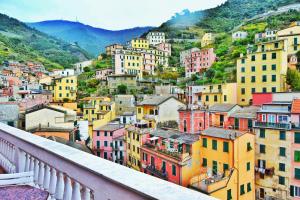 a view of a city from a balcony at Giadera penthouse 5terreparco in Riomaggiore