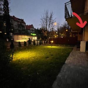 Vonkajšia záhrada v ubytovaní Apartament ONE ogródek i parking