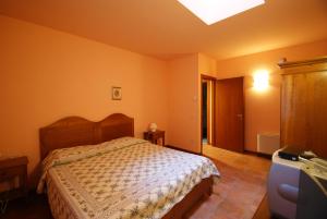 Una cama o camas en una habitación de Fattoria Villa Curti