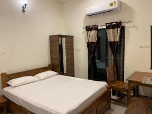 Cama o camas de una habitación en Erisha Tadoba