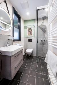 Ένα μπάνιο στο Domizil Apartment +13 φωτογραφίες