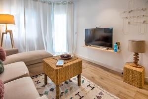 Telewizja i/lub zestaw kina domowego w obiekcie SibsSanlucar MARITIMO-1ª Linea de Playa