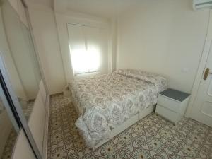 Postel nebo postele na pokoji v ubytování Triana