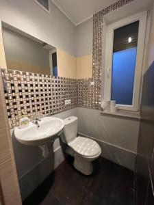 Kúpeľňa v ubytovaní Apartament ONE ogródek i parking