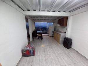Kuchyň nebo kuchyňský kout v ubytování Apartamento Campestre y Turístico con Garaje y Mirador + 8 fotografií