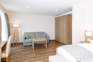 Postel nebo postele na pokoji v ubytování Hôtel de Chailly