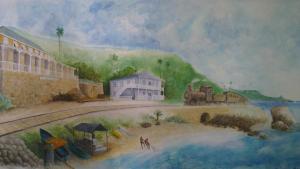 a painting of a building next to a river at The Atlantis Historic Inn in Saint Joseph