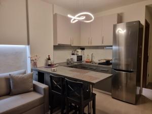 Kuchyňa alebo kuchynka v ubytovaní Iris City Center Premium Studio