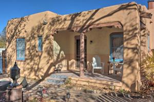a house with a cover over a patio at Cozy Adobe Casita 1 Mile to Santa Fe Plaza! in Santa Fe