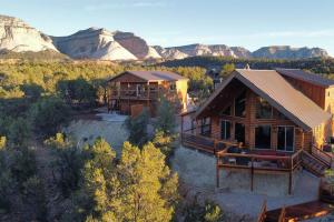 an aerial view of a cabin in the mountains at Cliff's Edge. New Build, Breathtaking Views, Luxury Stay Near Zion in Orderville