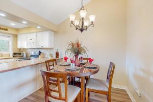 a kitchen with a dining room table and chairs at Aspenwood 4250 in Pagosa Springs