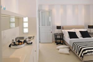 Posteľ alebo postele v izbe v ubytovaní Romantica Suites